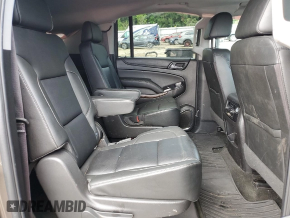 2016 Chevrolet Suburban LT z VIN 1GNSKHKC6GR360685, wystawiony jako Copart lot #56652175 z przebiegiem 115 212 mil mil oraz Szkoda całkowita • Salvage title. Historia ofert i sprzedaży dostępna na DreamBid. Obrazek 11.