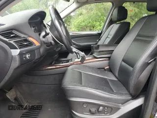 2012 BMW X5 35d with VIN 5UXZW0C54CL671377, listed as a Copart auction lot 60936395 with 105,903 mi miles and Salvage title. Bid and sale history available at DreamBid. Image 7.