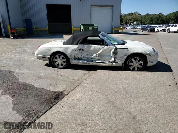 2002 Ford Thunderbird Hardtop Premium with VIN 1FAHP60A32Y125580, listed as a Copart auction lot 77493514 with 74,619 mi miles and Salvage Title. Bid and sale history available at DreamBid. Image 11.