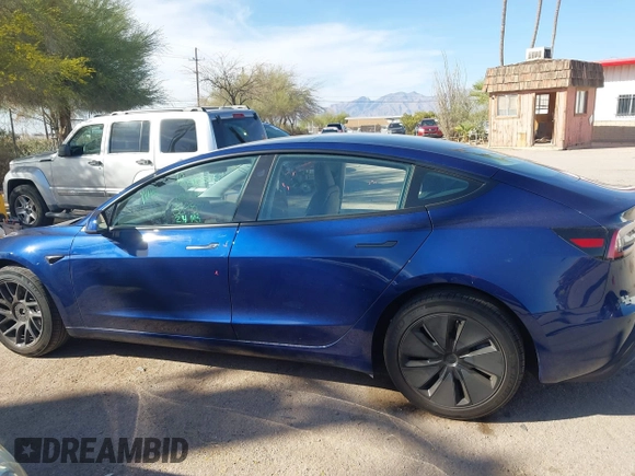 2024 Tesla Model 3 Long Range with VIN 5YJ3E1EB2RF758998, listed as a IAAI auction lot 41861108 with 14,531 mi miles and . Bid and sale history available at DreamBid. Image 15.