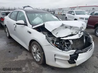 2016 Kia Optima EX with VIN 5XXGU4L30GG120518, listed as a IAAI auction lot 41602190 with 116,268 mi miles. Bid and sale history available at carsss.com. Image 1.