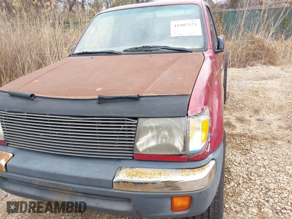 1999 Toyota Tacoma PreRunner z VIN 4TASM92N0XZ443454, wystawiony jako IAAI lot #41907523 z przebiegiem 237 864 mil mil oraz . Historia ofert i sprzedaży dostępna na DreamBid. Obrazek 6.