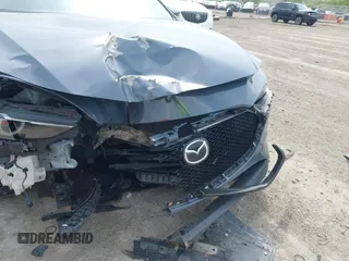 2020 Mazda 3 Premium with VIN JM1BPBNM3L1171285, listed as a IAAI auction lot 42097340 with 50,799 mi miles and . Bid and sale history available at DreamBid. Image 6.