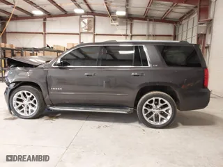 2015 Chevrolet Tahoe LTZ with VIN 1GNSCCKC2FR114442, listed as a IAAI auction lot 41629816 with 152,768 mi miles. Bid and sale history available at carsss.com. Image 14.