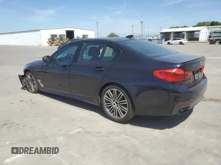2019 BMW 5 Series M550i xDrive with VIN WBAJB9C5XKB287877, listed as a Copart auction lot 52994065 with 52,460 mi miles and Salvage title. Bid and sale history available at DreamBid. Image 2.