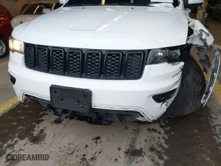 2019 Jeep Grand Cherokee Laredo E with VIN 1C4RJFAG1KC818289, listed as a IAAI auction lot 41602541 with 59,356 mi miles. Bid and sale history available at carsss.com. Image 21.