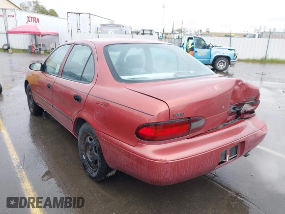 1997 Geo Prizm LSi with VIN 1Y1SK5265VZ457659, listed as a IAAI auction lot 41778510 with 149,073 mi miles. Bid and sale history available at carsss.com. Image 3.