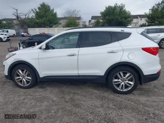 2013 Hyundai Santa Fe 2.0T Sport with VIN 5XYZUDLA8DG079795, listed as a IAAI auction lot 42035743 with 170,321 mi miles. Bid and sale history available at carsss.com. Image 14.