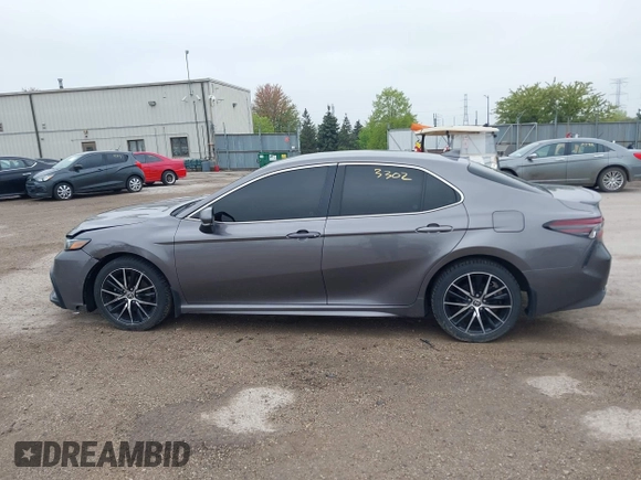 2023 Toyota Camry SE z VIN 4T1G11AK2PU088324, wystawiony jako IAAI lot #42173302 z przebiegiem 72 239 mil mil oraz . Historia ofert i sprzedaży dostępna na DreamBid. Obrazek 14.