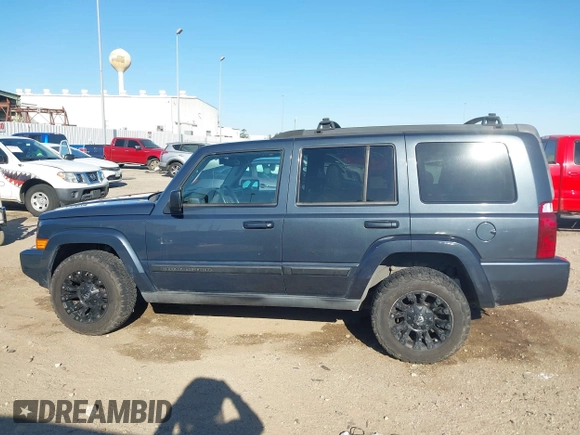 2007 Jeep Commander Sport with VIN 1J8HG48K87C666634, listed as a IAAI auction lot 41850134 with 162,208 mi miles. Bid and sale history available at carsss.com. Image 14.