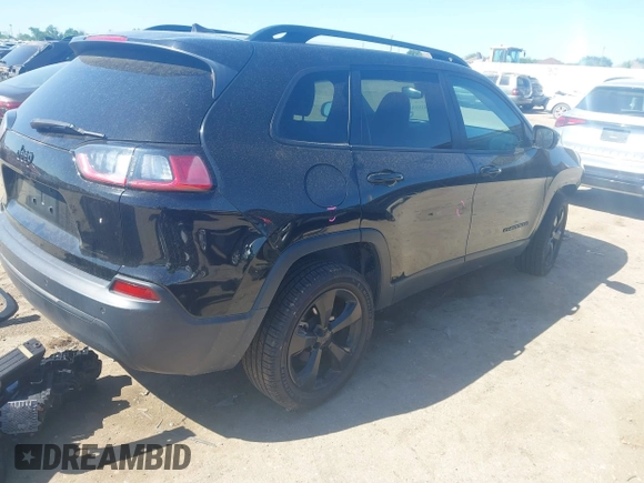 2021 Jeep Cherokee Altitude with VIN 1C4PJLLBXMD112667, listed as a IAAI auction lot 41959004 with 25,524 mi miles and . Bid and sale history available at DreamBid. Image 4.