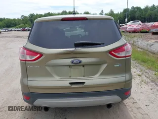 2013 Ford Escape SE z VIN 1FMCU9G92DUB27580, wystawiony jako IAAI lot #42626479 z przebiegiem 67 891 mil mil oraz . Historia ofert i sprzedaży dostępna na DreamBid. Obrazek 6.