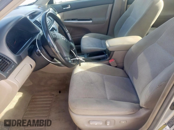 2006 Toyota Camry STD z VIN 4T1BE32K76U660821, wystawiony jako Copart lot #58806275 z przebiegiem 187 990 mil mil oraz Szkoda całkowita • Salvage title. Historia ofert i sprzedaży dostępna na DreamBid. Obrazek 7.