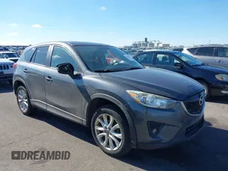 2014 Mazda CX-5 Grand Touring with VIN JM3KE4DY1E0364685, listed as a IAAI auction lot 41665349 with 135,751 mi miles. Bid and sale history available at carsss.com. Image 1.