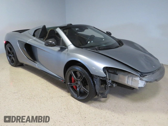 2016 McLaren 650S z VIN SBM11FAA1GW006061, wystawiony jako Copart lot #73406814 z przebiegiem 16 999 mil mil oraz Szkody całkowita. Historia ofert i sprzedaży dostępna na DreamBid. Obrazek 1.