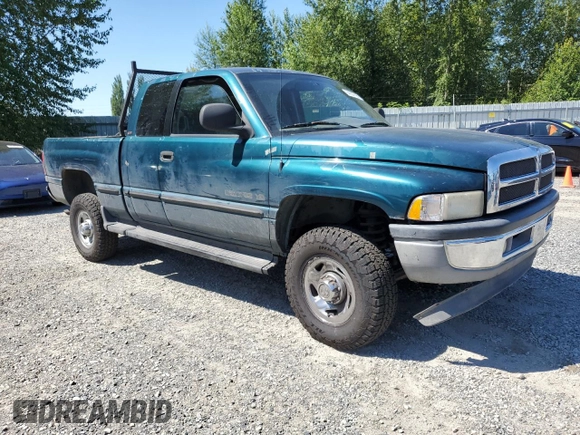 1999 Dodge 2500 with VIN 1B7KF23W2XJ539940, listed as a Copart auction lot 64237595 with 211,718 mi miles and Salvage title. Bid and sale history available at DreamBid. Image 4.