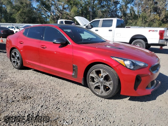 2020 Kia Stinger GT-Line with VIN KNAE15LA1L6084378, listed as a Copart auction lot 82859974 with 83,639 mi miles and Salvage Title. Bid and sale history available at carsss.com. Image 4.