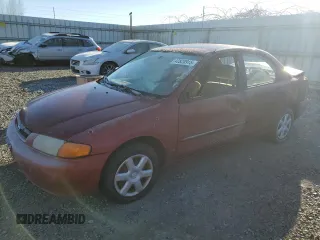 1998 Mazda Protege DX with VIN JM1BC1417W0198366, listed as a Copart auction lot 42820915 with 122,299 mi miles and Salvage Title. Bid and sale history available at DreamBid. Image 1.