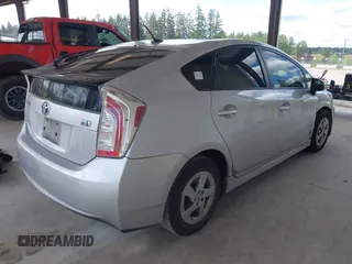 2015 Toyota Prius Four z VIN JTDKN3DU8F0427475, wystawiony jako IAAI lot #42338538 z przebiegiem 295 283 mil mil oraz . Historia ofert i sprzedaży dostępna na DreamBid. Obrazek 4.