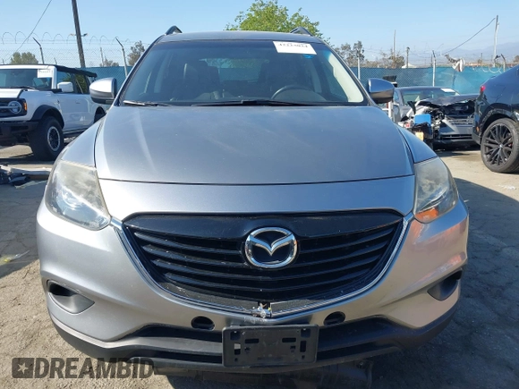 2013 Mazda CX-9 Touring z VIN JM3TB2CVXD0416533, wystawiony jako IAAI lot #42223034 z przebiegiem 135 990 mil mil oraz . Historia ofert i sprzedaży dostępna na DreamBid. Obrazek 12.