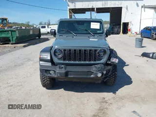 2024 Jeep Wrangler Sport S with VIN 1C4PJXDN2RW351741, listed as a IAAI auction lot 42122651 with 4,241 mi miles and . Bid and sale history available at DreamBid. Image 13.