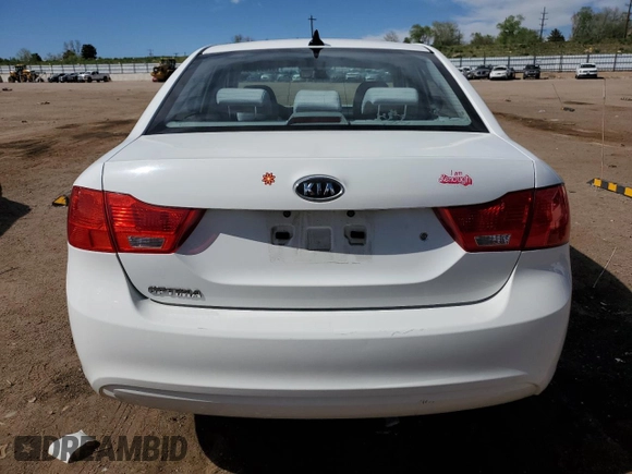 2010 Kia Optima LX z VIN KNAGG4A8XA5382979, wystawiony jako Copart lot #57067065 z przebiegiem 104 611 mil mil oraz Szkoda całkowita • Salvage title. Historia ofert i sprzedaży dostępna na DreamBid. Obrazek 6.