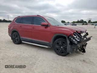 2018 Volkswagen Atlas SEL Premium with VIN 1V2NR2CA3JC521451, listed as a Copart auction lot 56914555 with 123,815 mi miles and Salvage title. Bid and sale history available at DreamBid. Image 4.