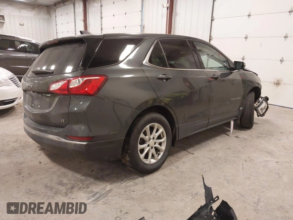 2019 Chevrolet Equinox LT with VIN 2GNAXKEV1K6157781, listed as a IAAI auction lot 41274846 with 128,425 mi miles and . Bid and sale history available at DreamBid. Image 4.