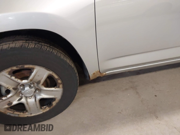 2007 Toyota RAV4 with VIN JTMBK33V776014769, listed as a IAAI auction lot 42024759 with 216,657 mi miles. Bid and sale history available at carsss.com. Image 6.