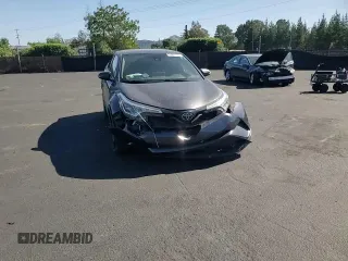 2019 Toyota C-HR XLE z VIN JTNKHMBX7K1050860, wystawiony jako Copart lot #55967135 z przebiegiem 60 330 mil mil oraz Szkoda całkowita • Salvage title. Historia ofert i sprzedaży dostępna na DreamBid. Obrazek 13.
