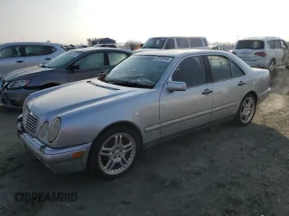 1997 Mercedes-Benz E-Class with VIN WDBJF72F6VA523987, listed as a Copart auction lot 82932444 with 216,038 mi miles and Clean Title. Bid and sale history available at carsss.com. Image 1.
