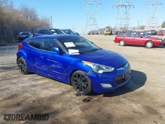 2012 Hyundai Veloster w/Black Int z VIN KMHTC6AD9CU046041, wystawiony jako IAAI lot #41772806 z przebiegiem 110 098 mil mil oraz . Historia ofert i sprzedaży dostępna na DreamBid. Obrazek 1.