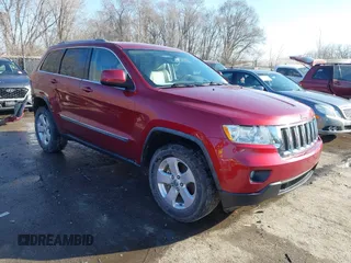 2012 Jeep Grand Cherokee Laredo with VIN 1C4RJFAG3CC163764, listed as a IAAI auction lot 41719137 with 198,827 mi miles. Bid and sale history available at carsss.com. Image 1.