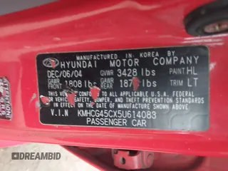2005 Hyundai Accent GLS with VIN KMHCG45CX5U614083, listed as a IAAI auction lot 41006582 with 72,516 mi miles. Bid and sale history available at carsss.com. Image 9.