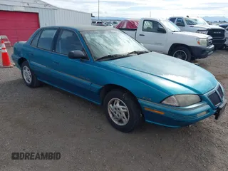 1995 Pontiac Grand Am z VIN 1G2NE55D5SC758616, wystawiony jako IAAI lot #42272999 z przebiegiem 129 707 mil mil oraz . Historia ofert i sprzedaży dostępna na DreamBid. Obrazek 1.