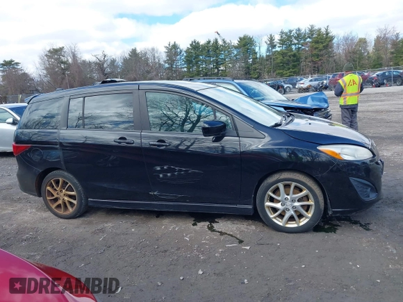 2012 Mazda 5 Touring with VIN JM1CW2CL8C0111574, listed as a IAAI auction lot 41999112 with 126,963 mi miles and . Bid and sale history available at DreamBid. Image 13.