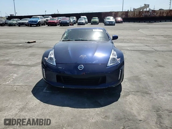 2016 Nissan 370Z z VIN JN1AZ4EH9GM933658, wystawiony jako Copart lot #48760215 z przebiegiem 70 682 mil mil oraz Szkoda całkowita • Salvage title. Historia ofert i sprzedaży dostępna na DreamBid. Obrazek 11.