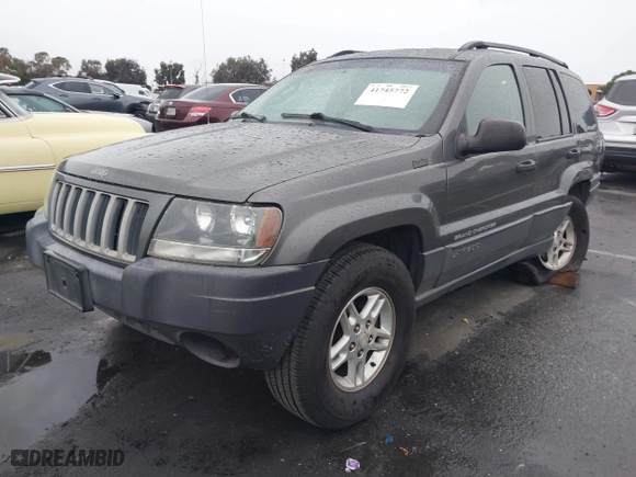 2004 Jeep Grand Cherokee Laredo with VIN 1J4GX48S14C177923, listed as a IAAI auction lot 41745772 with 242,506 mi miles. Bid and sale history available at carsss.com. Image 17.
