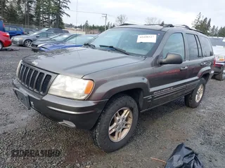 1999 Jeep Grand Cherokee Limited with VIN 1J4GW68N7XC739479, listed as a IAAI auction lot 41448323 with 129,840 mi miles. Bid and sale history available at carsss.com. Image 17.