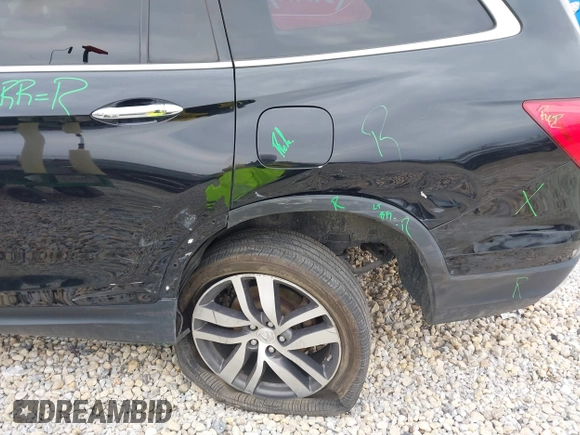 2017 Honda Pilot Touring with VIN 5FNYF6H90HB051700, listed as a IAAI auction lot 41902075 with 69,712 mi miles. Bid and sale history available at carsss.com. Image 6.
