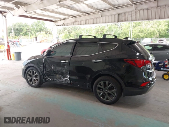 2018 Hyundai Santa Fe Ultimate z VIN 5NMZW4LA6JH054308, wystawiony jako IAAI lot #42385503 z przebiegiem 108 004 mil mil oraz . Historia ofert i sprzedaży dostępna na DreamBid. Obrazek 14.