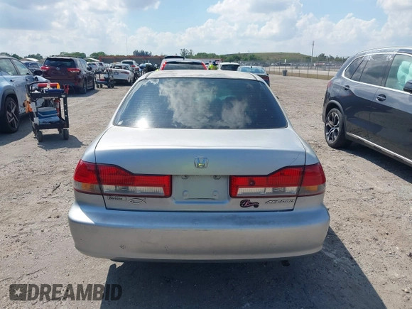 2002 Honda Accord LX z VIN JHMCG56462C005400, wystawiony jako IAAI lot #41893400 z przebiegiem Nie podano mil oraz . Historia ofert i sprzedaży dostępna na DreamBid. Obrazek 17.