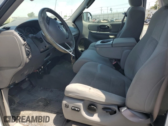 2003 Ford F-150 XL with VIN 2FTRX17L23CA17128, listed as a Copart auction lot 60144965 with 121,055 mi miles and Salvage title. Bid and sale history available at DreamBid. Image 7.