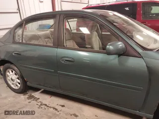 1998 Chevrolet Malibu LS with VIN 1G1NE52M6W6104642, listed as a IAAI auction lot 41636923 with 116,944 mi miles. Bid and sale history available at carsss.com. Image 14.