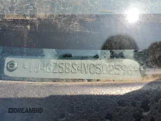 1997 Jeep Grand Cherokee Laredo z VIN 1J4GZ58S4VC502596, wystawiony jako Copart lot #88255865 z przebiegiem Nie podano mil oraz Nie do naprawy • Non repairable. Historia ofert i sprzedaży dostępna na DreamBid. Obrazek 12.