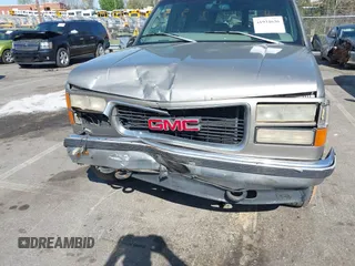 1999 GMC Suburban with VIN 3GKFK16R4XG514928, listed as a IAAI auction lot 41934636 with 245,010 mi miles and . Bid and sale history available at DreamBid. Image 6.