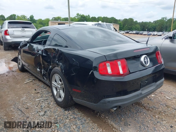 2012 Ford Mustang Premium with VIN 1ZVBP8AM4C5285696, listed as a IAAI auction lot 42465296 with 143,387 mi miles and . Bid and sale history available at DreamBid. Image 3.