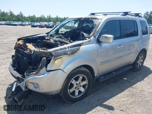 2010 Honda Pilot Touring z VIN 5FNYF4H94AB010058, wystawiony jako IAAI lot #42495313 z przebiegiem 157 306 mil mil oraz . Historia ofert i sprzedaży dostępna na DreamBid. Obrazek 2.