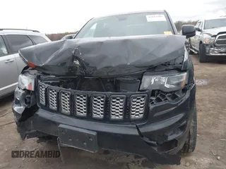2017 Jeep Grand Cherokee Laredo with VIN 1C4RJFAG7HC886640, listed as a IAAI auction lot 42035301 with 197,110 mi miles. Bid and sale history available at carsss.com. Image 13.