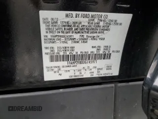 2013 Ford Taurus Limited with VIN 1FAHP2F80DG145971, listed as a Copart auction lot 59947915 with 101,693 mi miles and Salvage title. Bid and sale history available at DreamBid. Image 12.